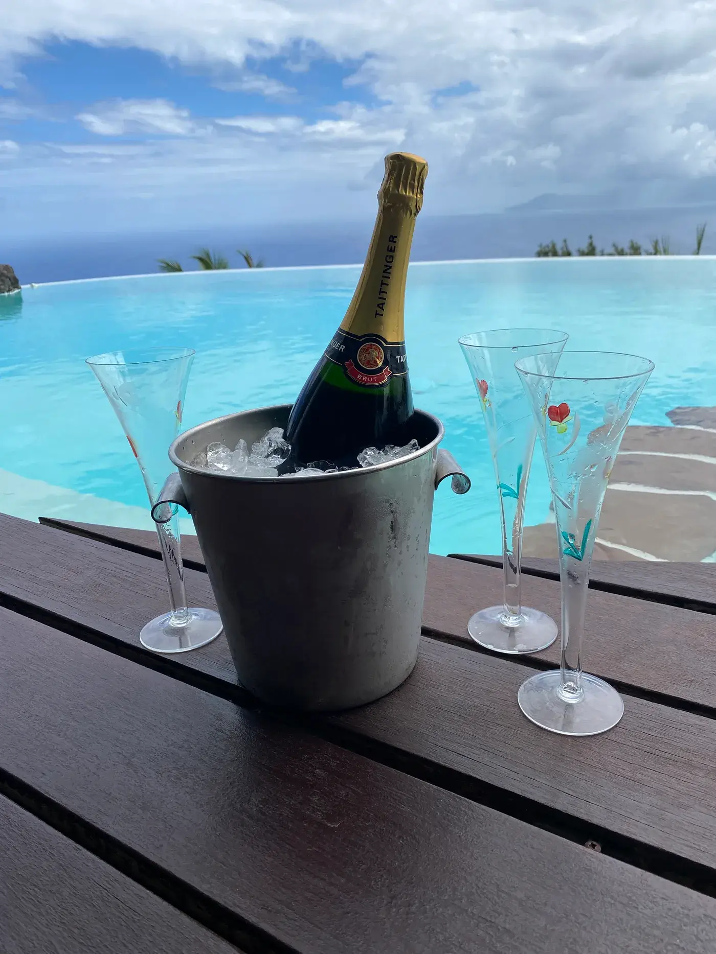 Champagne bucket beside the infinity pool with lagoon view